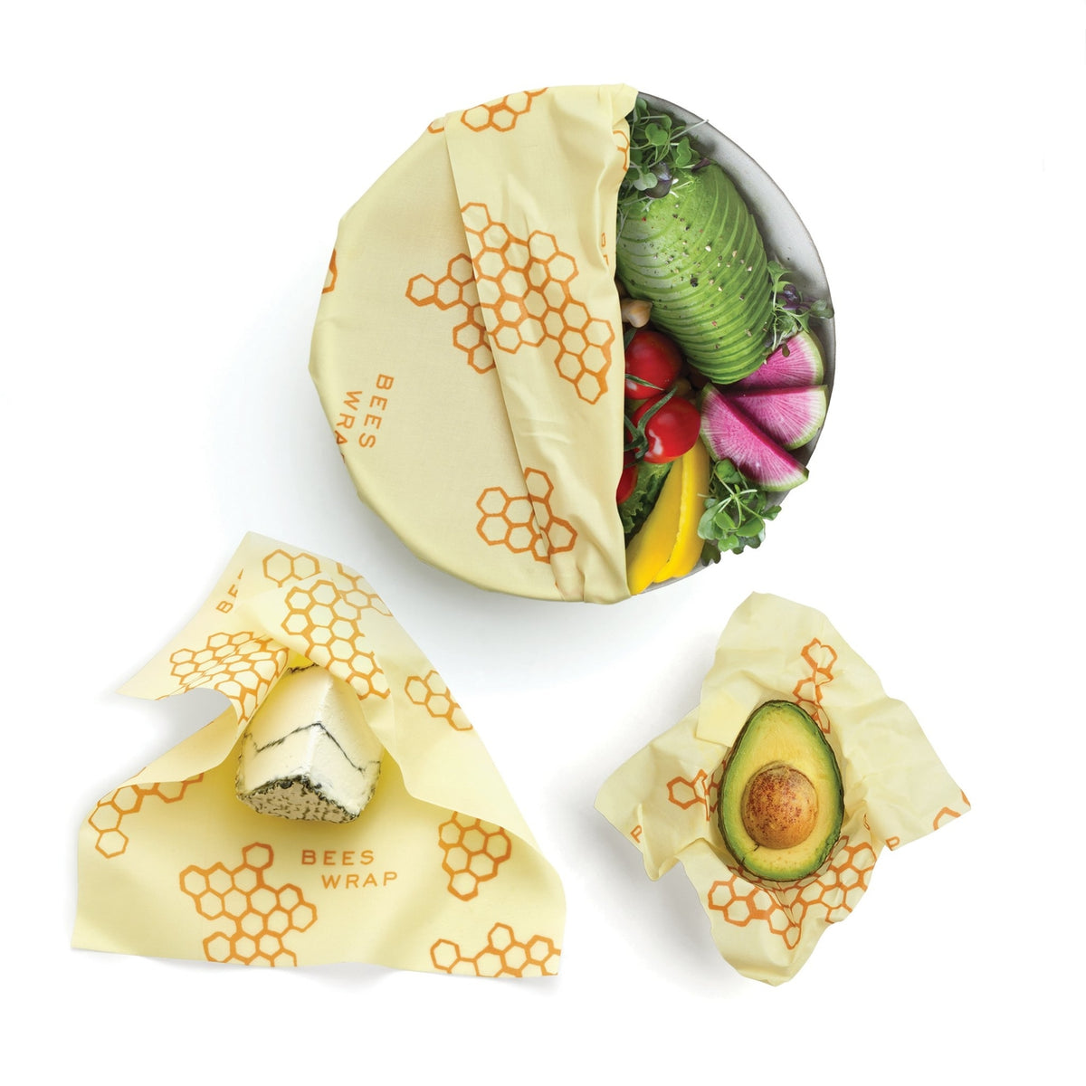 Beeswax wraps with fruits and vegetables on a white background