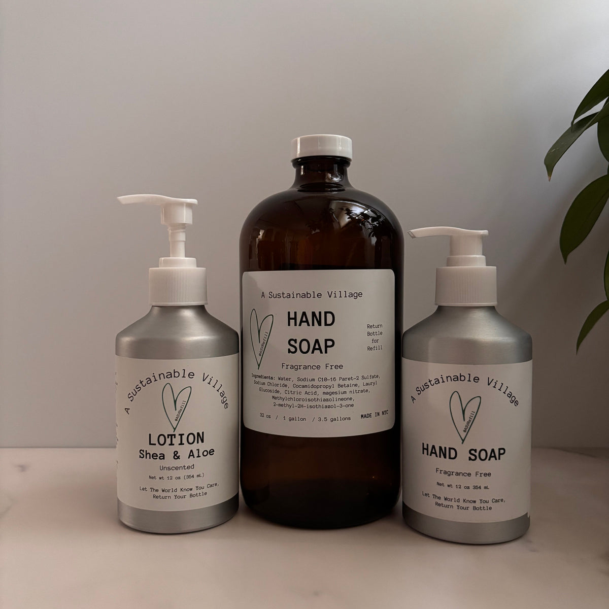 Hand Soap in 32 oz amber glass and 12 oz aluminum bottle with lotion in aluminum refillable bottle
