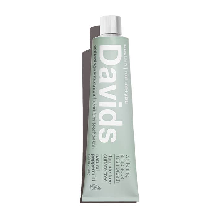 Tube of Davids toothpaste on a white background