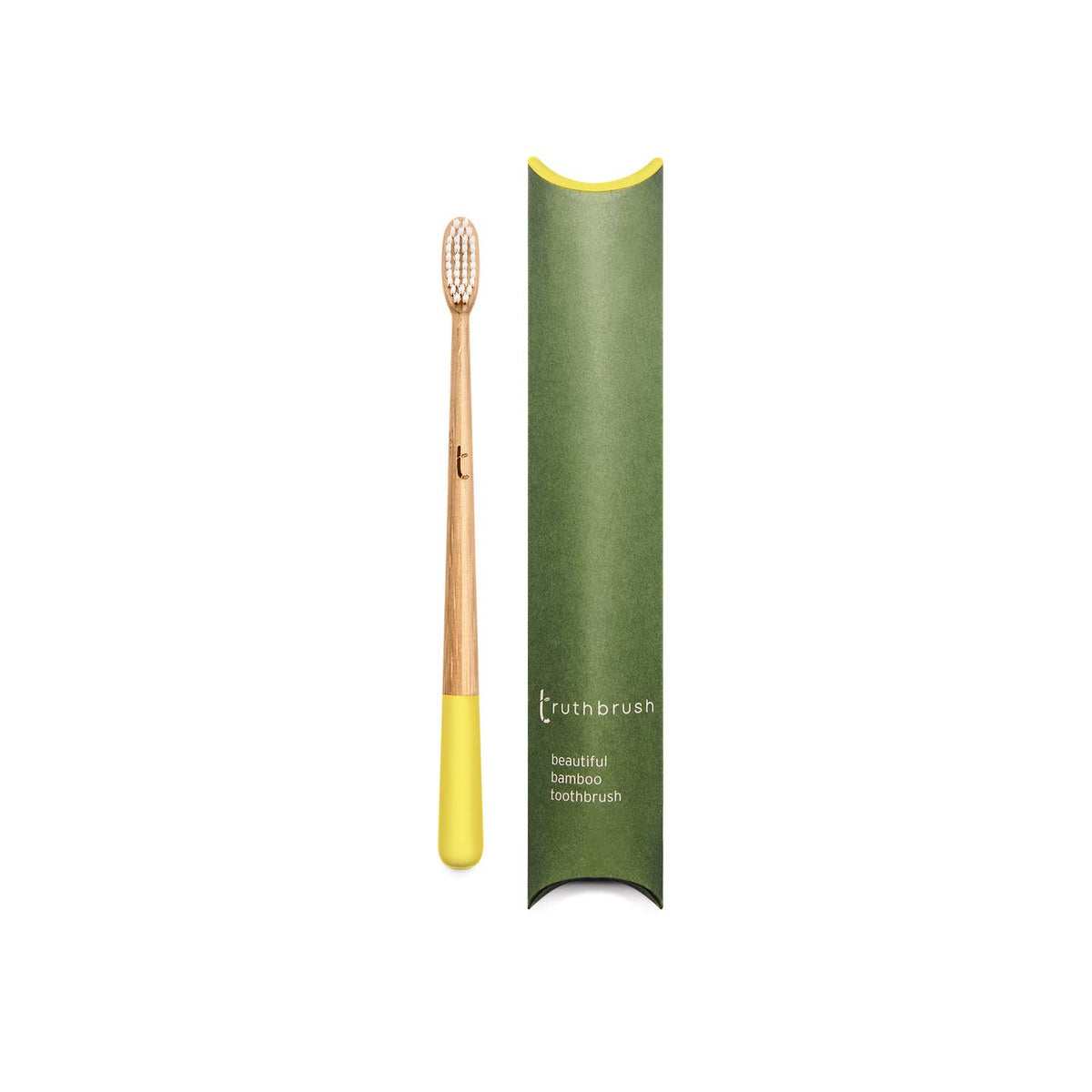 Bamboo toothbrush with green holder on a white background