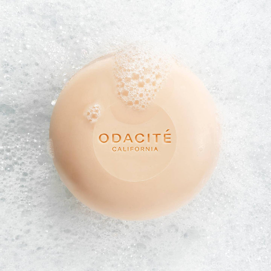 Bar of soap with 'Odacite California' branding on a textured white background