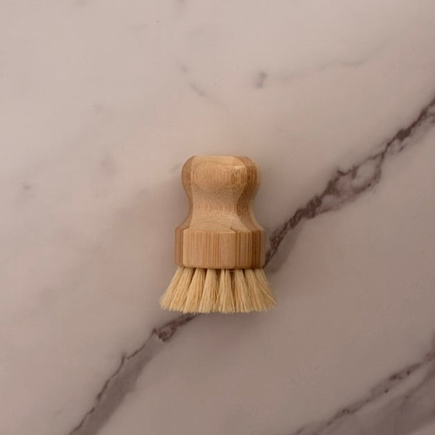 Bamboo Sisal Multi Purpose brush on a marble surface