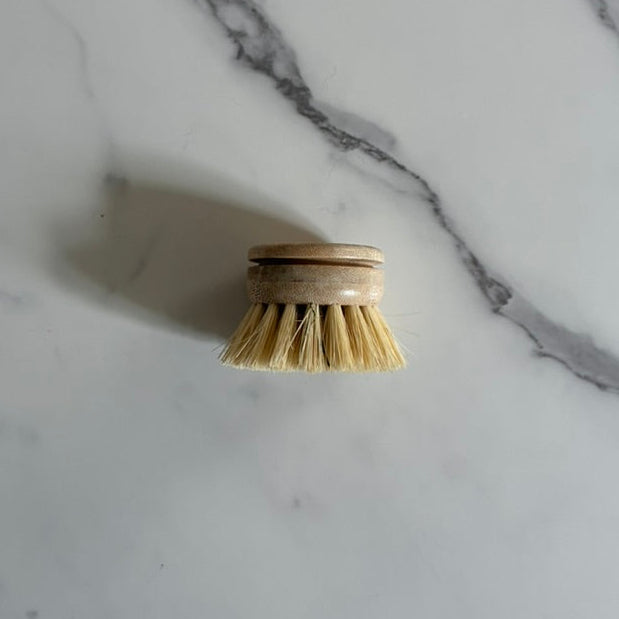Natural Bamboo Dish scrubber on a marble surface
