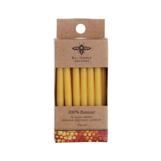 Pack of 12 hand-dipped beeswax birthday candles in a cardboard box with Big Dipper Wax Works branding.