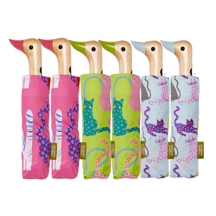 Set of six colorful duck-shaped Cats Duck Umbrellas featuring cat illustrations on a white background.