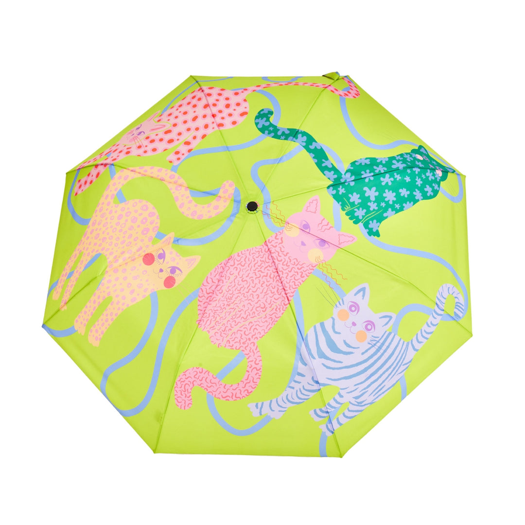 Colorful Lyme Green umbrella with animal patterns on a green background
