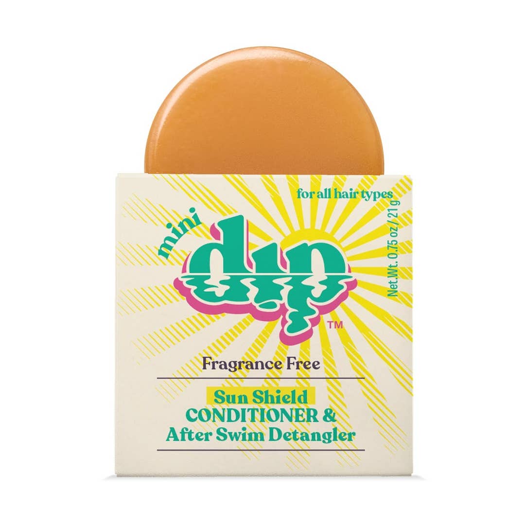 Mini Dap sun shield conditioner and after swim detangler with packaging on a white background