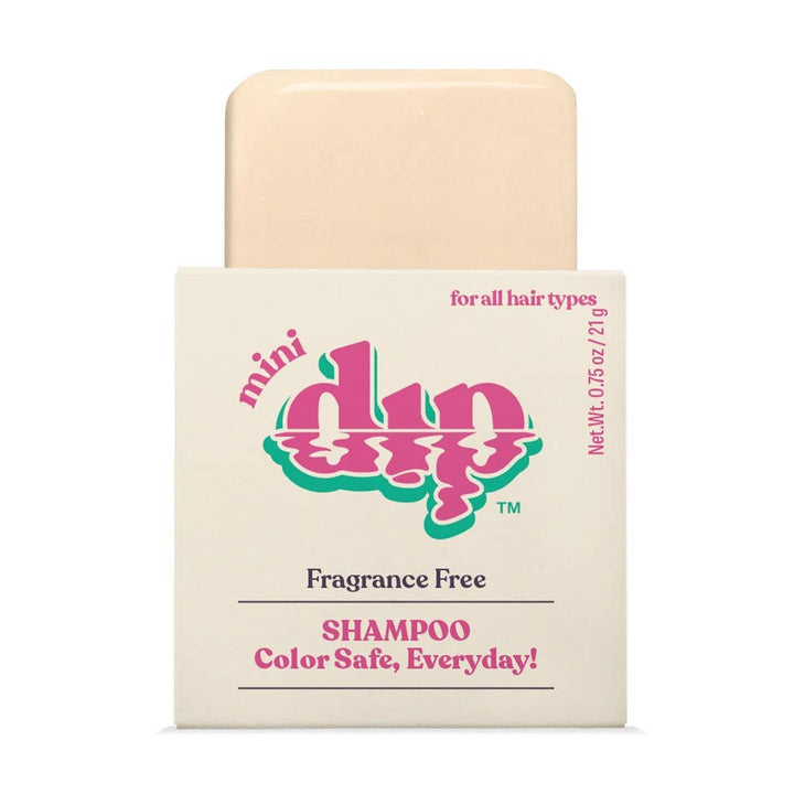 Bar of shampoo with packaging labeled 'mini dip' on a white background