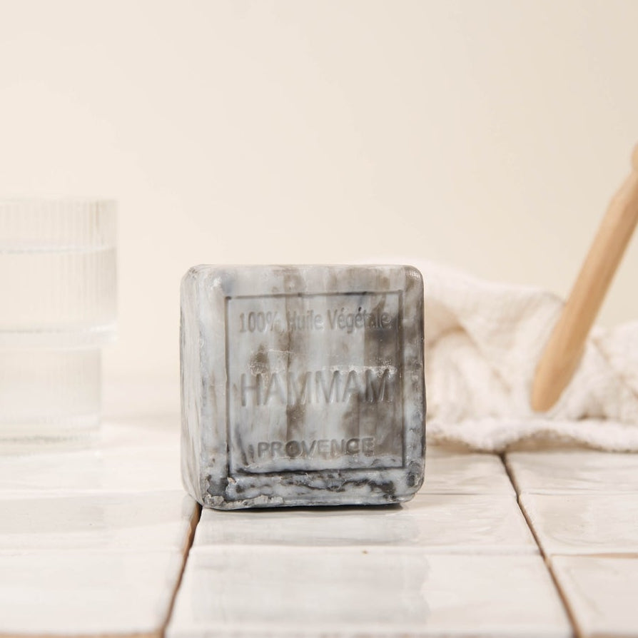 Wooden blocks with a measuring tool on a white surface
