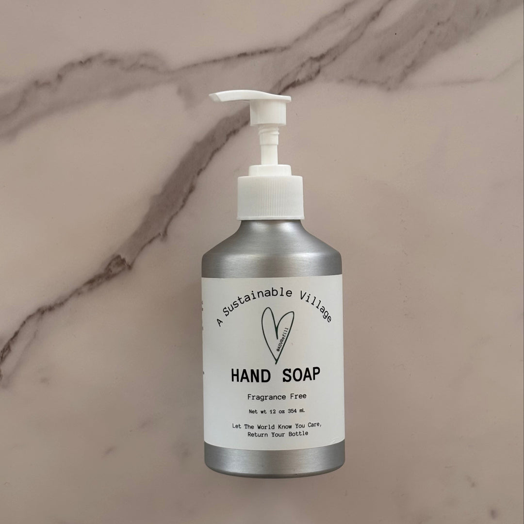 Hand soap bottle with pump on a marble surface