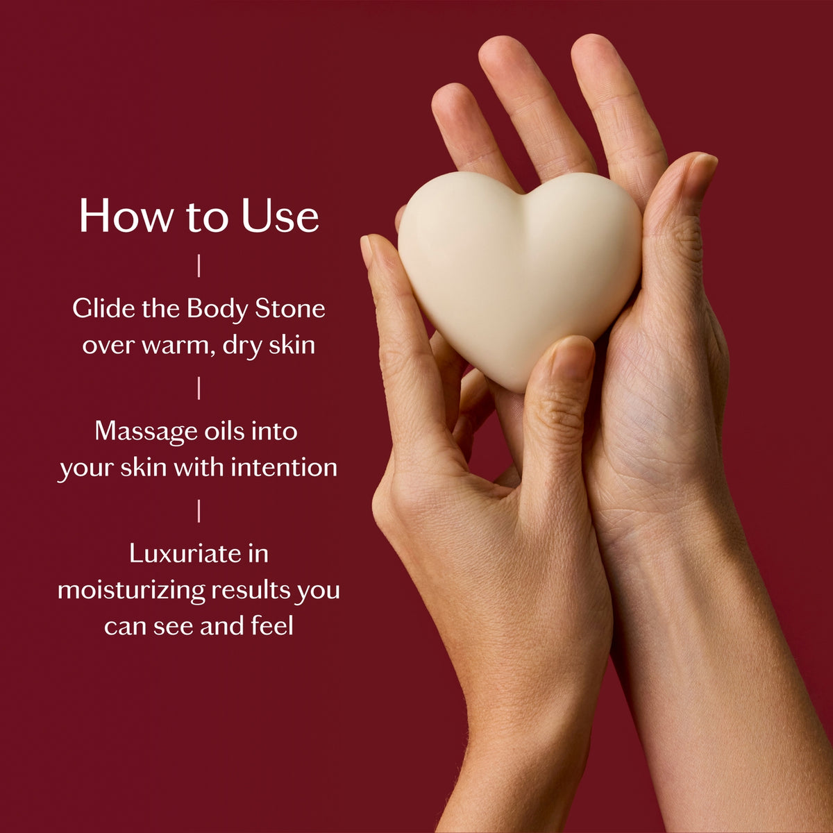 Heart-shaped body stone held between two hands with usage instructions on a red background