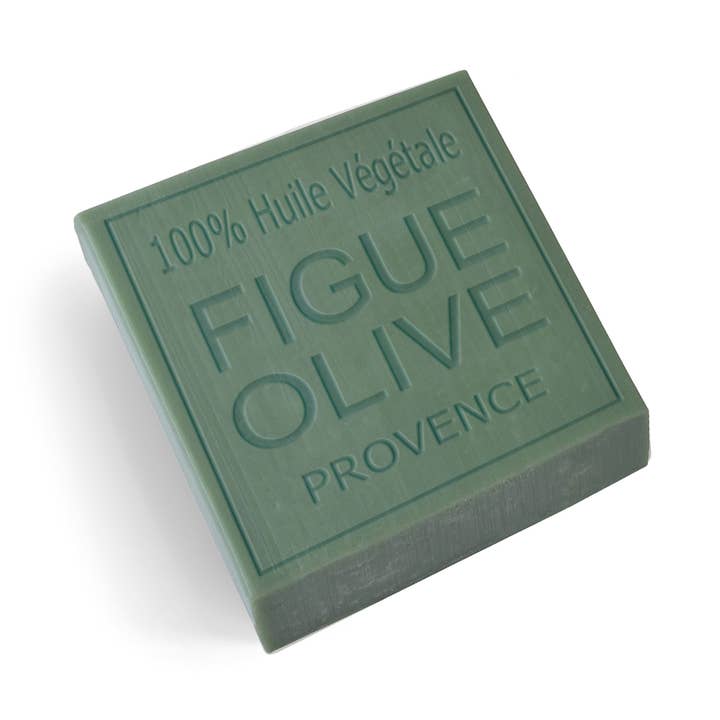 A square green bar of soap embossed with 'FIGUE OLIVE PROVENCE' and '100% Huile Vgétale' on a plain white background.