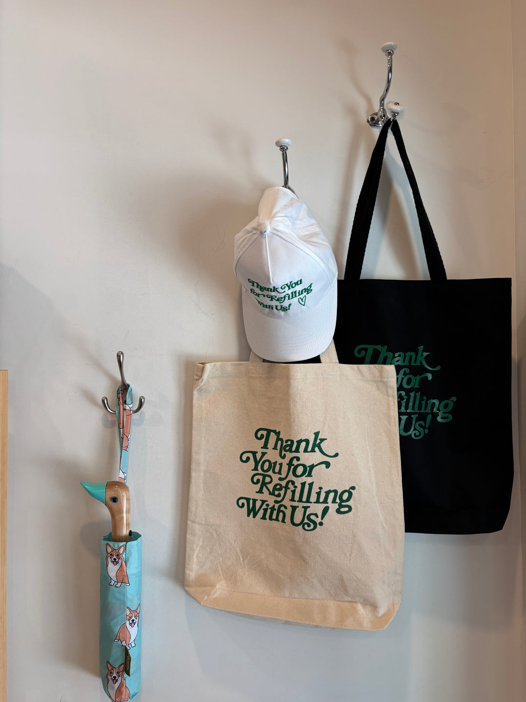 Natural + Black "Thank You for Refilling With Us" tote bag and baseball cap