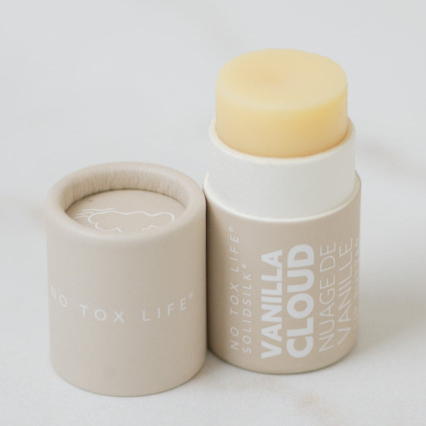 Vanilla cloud product with beige lid on a white background