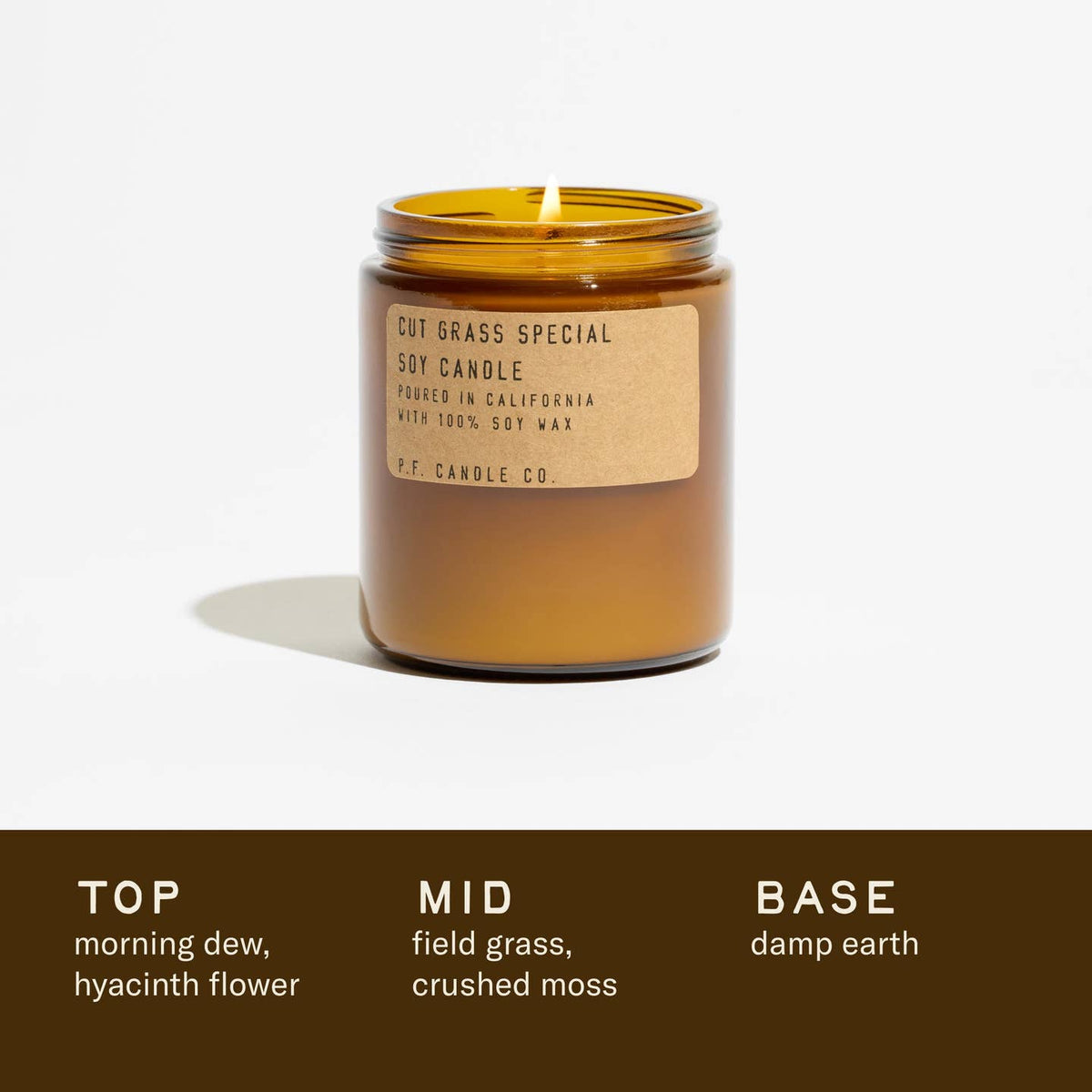 Candle with a label on a white background, featuring a color swatch at the bottom.