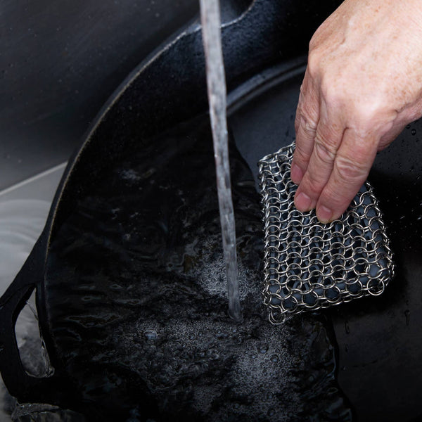 Stainless steel and silicone cast iron scrubber