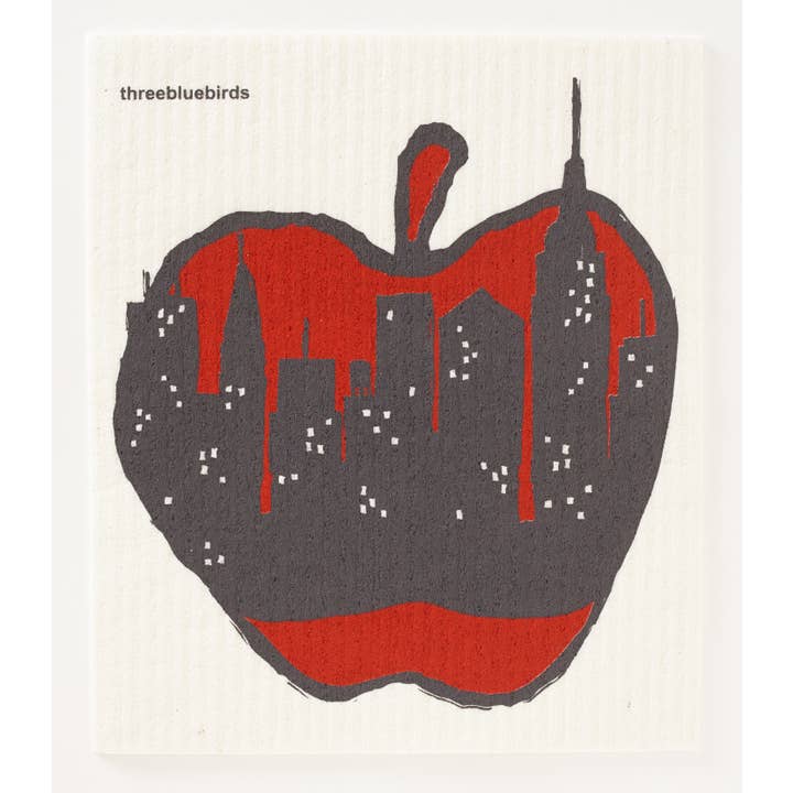 A Swedish dishcloth with a city skyline silhouette in red and gray on a white background, branded by threebluebirds.