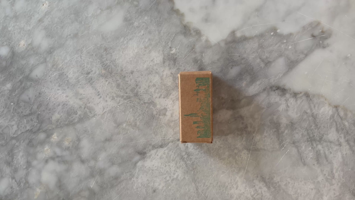 Floss in Glass Container